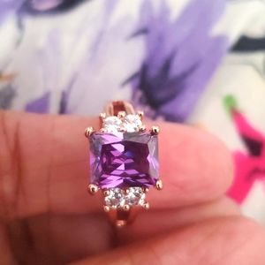 Purple color Cz stones ring on rose gold